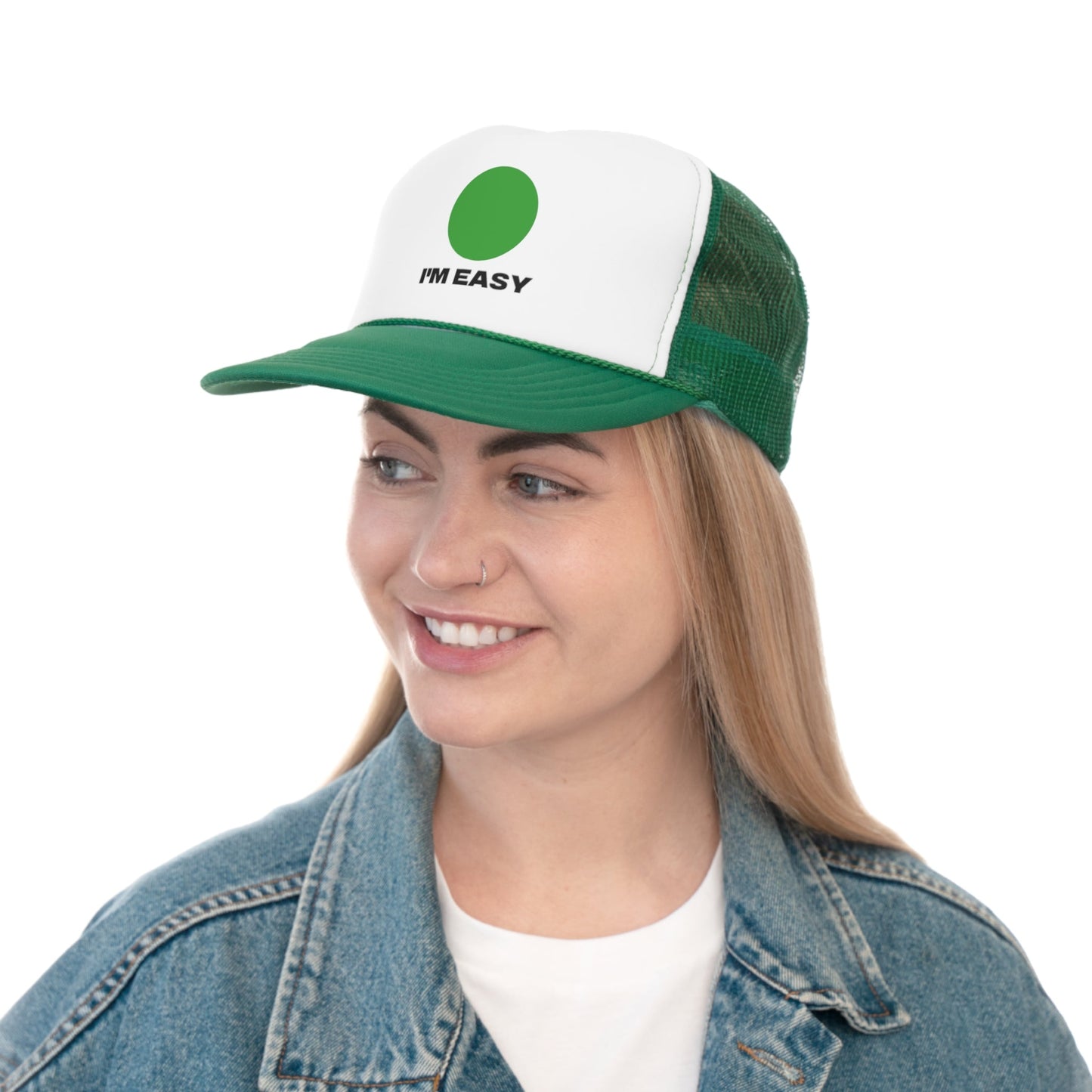 Green trucker hat with white label and black lettering saying "I'm Easy" and a green circle sign. It is perfect for keeping the sun out of your face while you're skiing or snowboarding. The phrase "I'm Easy" is a humorous way to express the carefree attitude of the apres ski lifestyle. The green circle sign is a reference to the Telluride Ski Resort's Green Circle runs, which are the easiest runs on the mountain. 